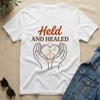 held and healed T-Shirt